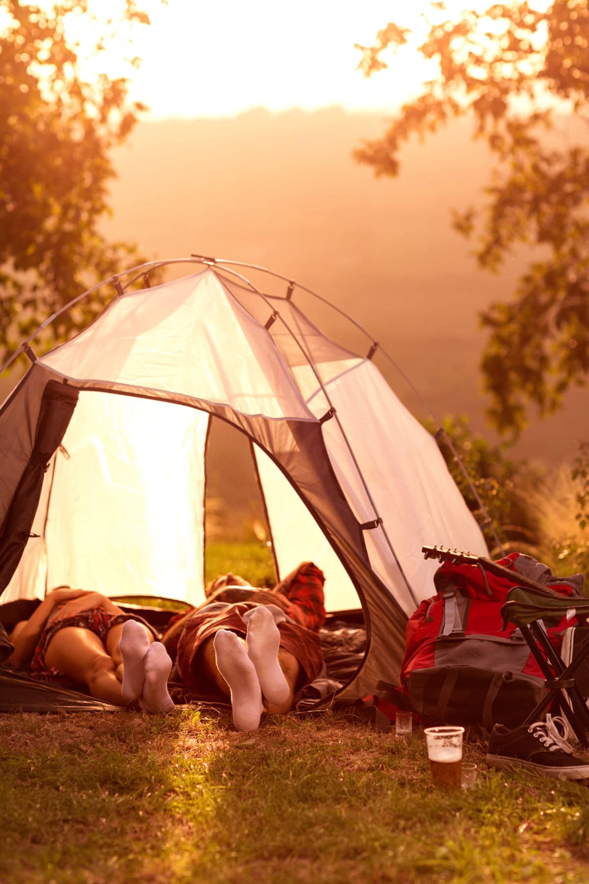 Couple sleeping in tent